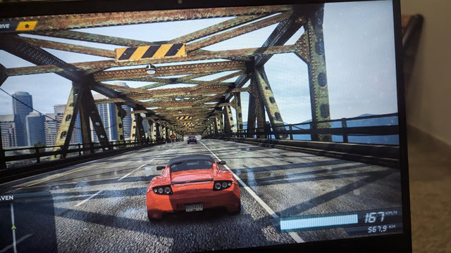 a red tesla roadster 2.5 Sport in need for speed most wanted 2012
