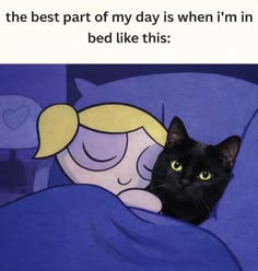 A meme featuring the cartoon character Bubbles from The Powerpuff Girls tucked into a blue bed next to a real black cat with green eyes. The text above reads: "the best part of my day is when i'm in bed like this:".