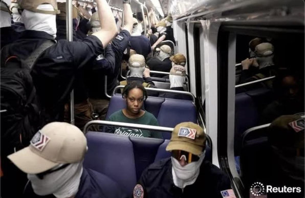 Terrified black woman surrounded by patriot front maga nazis on train
