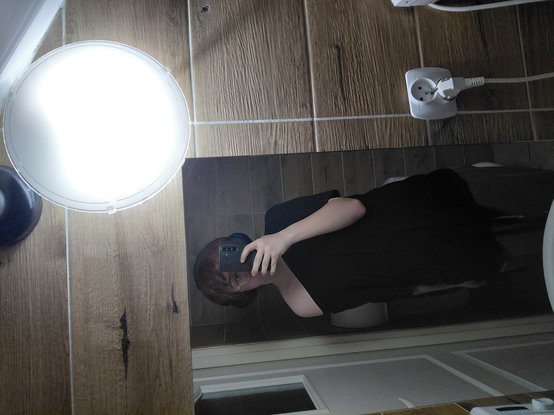 ellie in the bathroom with shoulder out