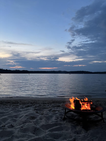 Just after sunset on the beach, with a fire pit going 