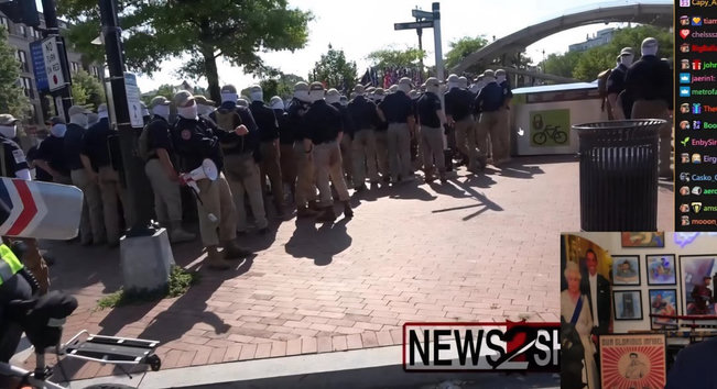 Boys standing around in soiled pants, proud