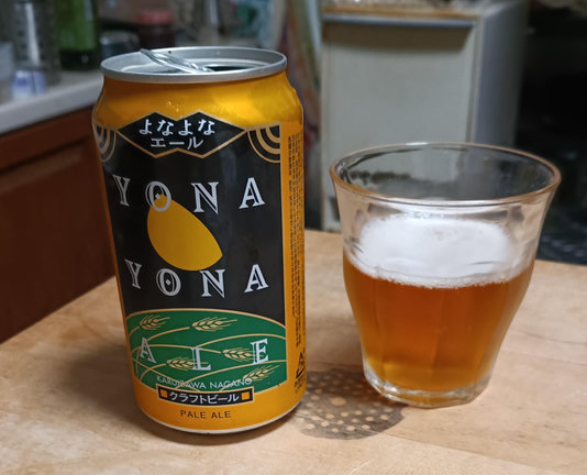 A can of Yona Yona ale, and a glass into which a portion of the contents have been decanted.