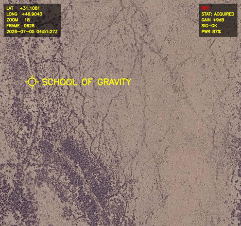 Aerial satellite photo labelled in bright yellow letters: 

1. School of Gravity

Actual coordinates: 31.1081° N, 46.9043° E