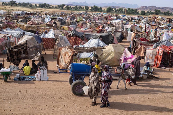 Displaced Sudanese civilians at Um Yanqur camp. (AFP/File)
