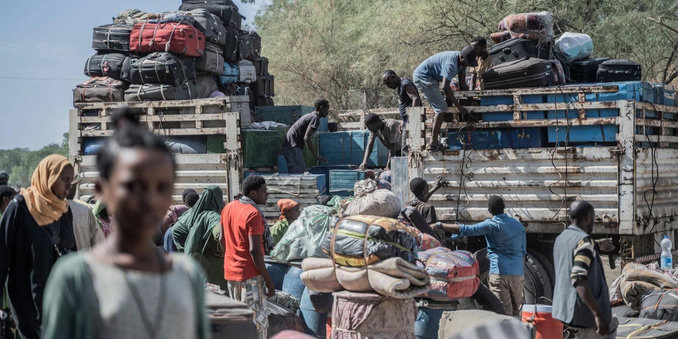 Image — Refugees at the border with Ethiopia fleeing Sudan’s civil war. As the conflict worsens, those still in Sudan risk famine. Photo: Amanuel Sileshi / AFP via Getty Images