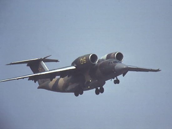 An-72 plane, in military camouflage, taking off