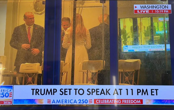 TV screenshot, Trump seen though a window in front of a Tv showing the exact same image