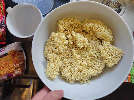 a biiig bowl of uncooked noodles