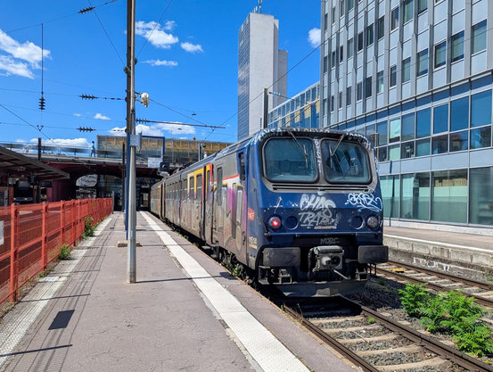 A very dirty Z2 trainset, completely covered in Graffiti, outside Nancy station