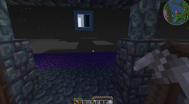 A view above the clouds in Voxelibre, from a "meditation platform". The moon, square-shaped, is half full.