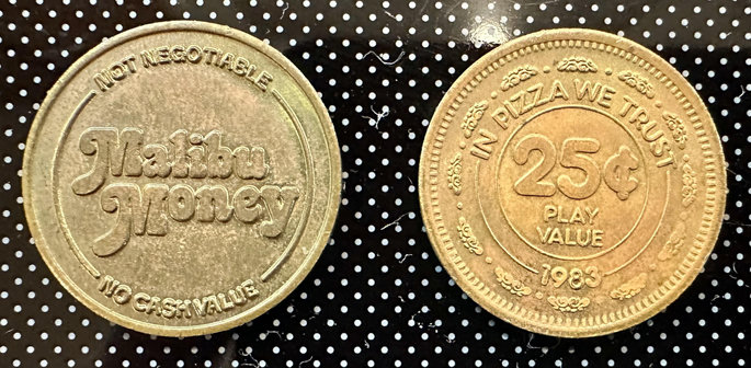 Old game tokens from Malibu Fun Centers and Chuck E. Cheese