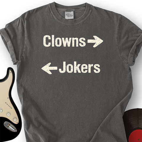 T-shirt with the text:
Clowns →
← Jokers
which is a reference to the Stealer's Wheel 1970s Dylanesque pop bubblegum favorite, "Stuck in the Middle with You"
