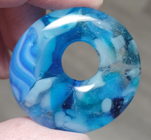 blue pendant with mostly speckles