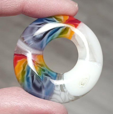 white and rainbow design with the rainbow distorted and feathered and stretched out