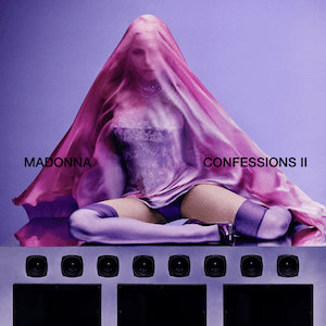 Albumcover Madonna - Confessions 2. Madonna sitzt auf einem Podest, sie wird von einem durchsichtigen rosa Tuch verhüllt und bildet durch ihre Pose ein Dreieck. Die Hintergundfarbe ist lila, ebenso wie ihre Strümpfe und Corsage.