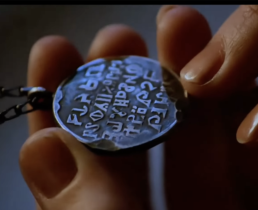 Lone Star's necklace from Spaceballs, certifying him as a Prince.