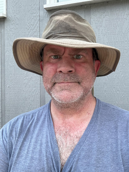 Yours truly in a sweat-soaked v-neck t-shirt and a mostly sweat-soaked sun hat. I look very hot, yet somehow still powerfully sexy. 