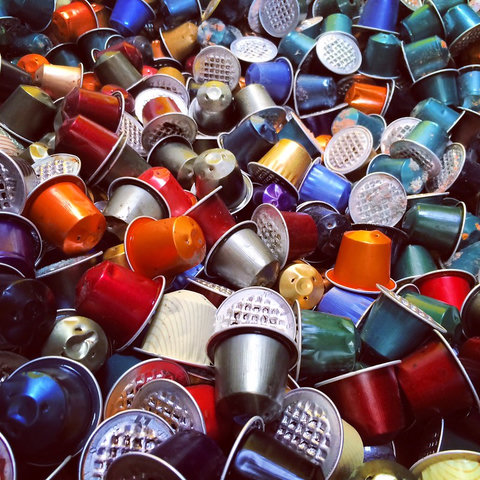 Photo of a mound of coffee pods of all different colours