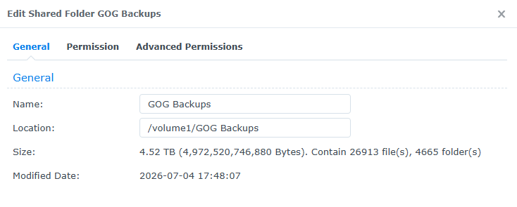 A screenshot from Synology DiskStation showing a shared folder "GOG Backups". It has a size of 4.52 TB, containing 26,913 files in 4,665 folders.

Exact Transcript:
Edit Shared Folder GOG Backups x
General Permission Advanced Permissions
General
Name: GOG Backups
Location: /volume1/GOG Backups
Size: 4.52 TB (4,972,520,746,880 Bytes). Contain 26913 file(s), 4665 folder(s)
Modified Date: 2026-07-04 17:48:07
