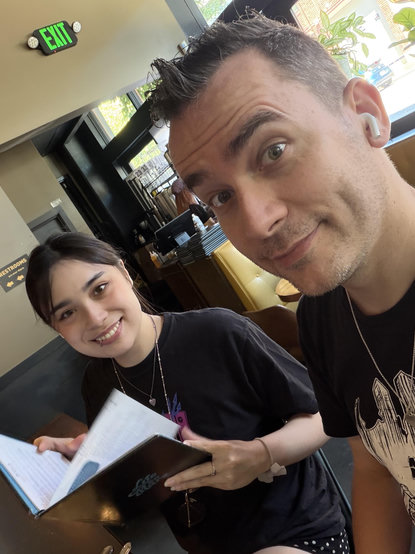 a man and woman at a bar