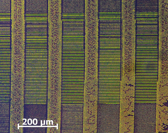 a magneto-optical microscope photo of a floppy disk showing flux transitions (horizontal) and erase head tracks (vertical)

credit:
https://commons.wikimedia.org/wiki/File:Visualization_of_magnetic_information_on_a_Floppy_Disk_%28CMOS-MagView%29.jpg