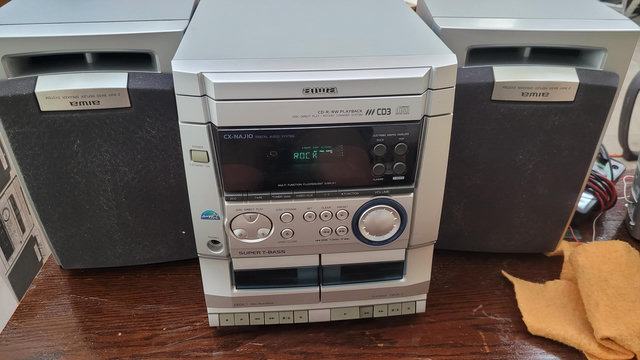 Music system with upside down speakers