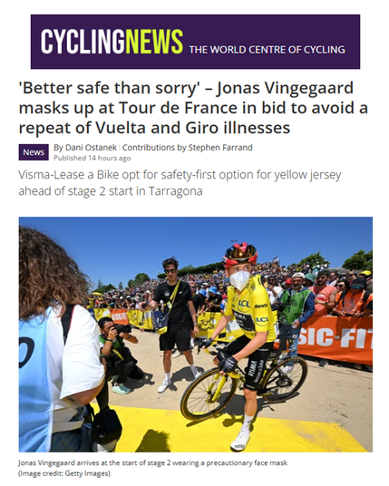 An image showing an article from Cyclingnews, titled "'Better safe than sorry' – Jonas Vingegaard masks up at Tour de France in bid to avoid a repeat of Vuelta and Giro illnesses". The article was written by Dani Ostanek and published 14 hours prior. It mentions that Visma-Lease a Bike opted for a safety-first option for the yellow jersey wearer ahead of the stage 2 start in Tarragona.
Below the text is a photograph of cyclist Jonas Vingegaard arriving at the start of stage 2. He is wearing his yellow jersey, a cycling helmet, sunglasses, and a white precautionary face mask while sitting on his bicycle. A crowd of spectators and event staff surround him in the background under a bright, sunny sky. The image credit is given to Getty Images.